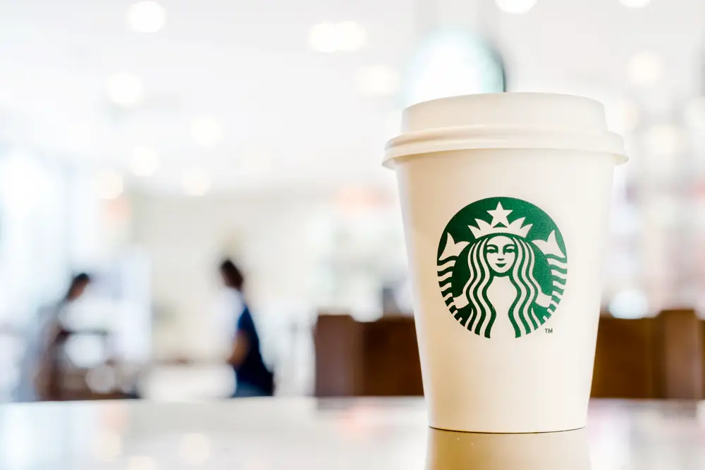 Starbucks-hot-beverage-sitting-on-coffee-shop-table