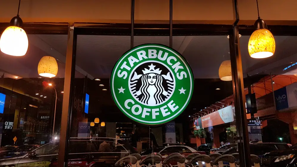 Starbucks-lighted-sign-at-entrance-to-coffee-shop